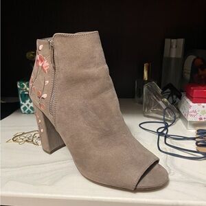 Woman’s peep toe booties